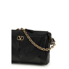 Valentino Garavani Schwarze Lammfell-Schultertasche (Ovis Aries Aries)