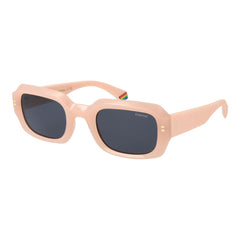 Sunglasses with a peach frame and dark lenses on a white background