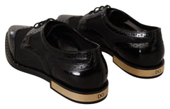 Dolce & Gabbana Schwarze Leder-Brogues mit transparenter Flügelkappe
