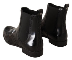 Dolce & Gabbana Schwarze knöchelhohe flache Lederstiefeletten