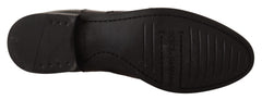 Dolce & Gabbana Schwarze knöchelhohe flache Lederstiefeletten