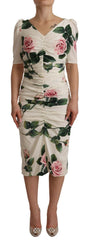 Dolce & Gabbana Plissiertes Kleid aus Stretch-Seide mit weißen Rosenmuster