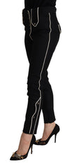 Dolce & Gabbana Schwarze Mid-Waist Hose mit Knopfverzierungen und schmaler Passform