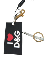 Dolce & Gabbana Schlüsselanhänger aus schwarzem Silikon mit DG Logo aus goldfarbenem Messing