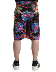 Dolce & Gabbana Herren Bermuda-Shorts mit mehrfarbigem Luminarie-Print