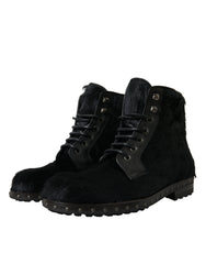 Dolce & Gabbana Schwarze kniehohe Stiefel aus Leder im Pony-Stil
