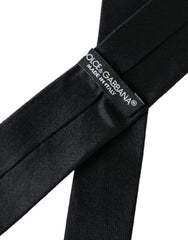 Dolce & Gabbana Schwarze, einfarbige Krawatte aus 100 % Seide zum Binden