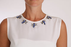 Dolce & Gabbana Weißes Seiden-T-Shirt mit Kristallverzierung und Fliegen-Motiv
