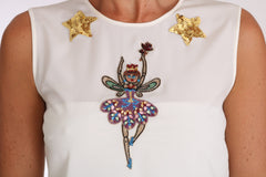 Dolce & Gabbana Weißes Seiden-Oberteil mit Kristall-Pailletten und Feen-Applikation