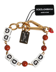 Dolce & Gabbana Mehrfarbiges Armband mit DG Logo-Würfeln aus goldfarbenem Messing