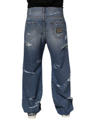 Dolce & Gabbana Blaue zerrissene Jeans aus Baumwolle mit Logo-Plakette