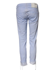 Acht lichtblauwe katoenen slim fit denim lage taille jeans