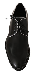 Dolce & Gabbana Schwarze Leder-Derby-Schuhe mit weißer Linie