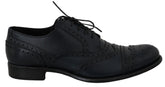 Dolce & Gabbana Dunkelblaue Oxford-Slipper mit Flügelkappen aus Leder