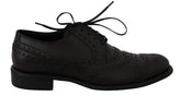 Dolce & Gabbana Schwarze Oxford-Business-Schuhe aus Leder mit Flügelkappenmuster