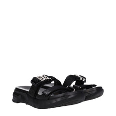 Givenchy Slipper aus schwarzem Stoff
