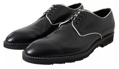 Dolce & Gabbana – Formelle Abendschuhe aus schwarzem und weißem Leder