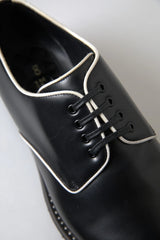 Dolce & Gabbana – Formelle Abendschuhe aus schwarzem und weißem Leder