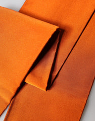 Dolce & Gabbana orangefarbener Seidenschal mit Fransen