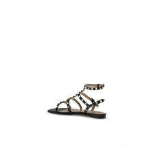 Valentino Garavani Schwarze flache Sandalen aus Kalbsleder Bos Taurus