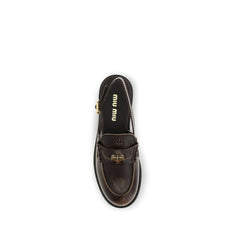 Miu Miu Bruine Kalfsleren Bos Taurus Instaploafers