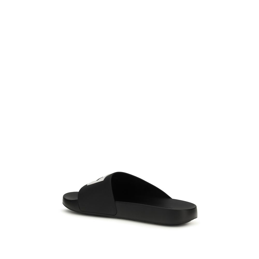 Givenchy Schwarze Gummi-Slipper