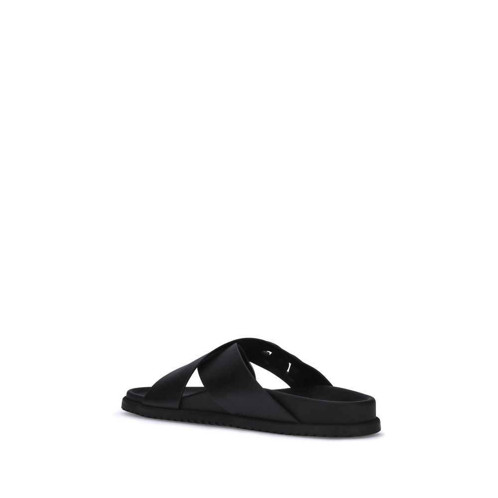 Dolce & Gabbana Schwarze flache Sandalen aus Kalbsleder Bos Taurus