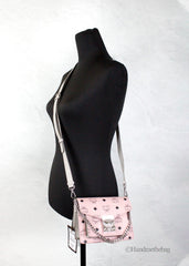 MCM Signature Patricia Umhängetasche mit Überschlag und Schloss aus Leder, Mini