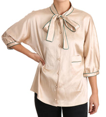 Dolce & Gabbana Beige Seiden-Stretch-Oberteil mit Schleifenbesatz