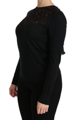 Dolce & Gabbana Schwarze Seidenbluse mit Rundhalsausschnitt und Spitze