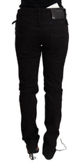 Acht schwarze Low-Waist Skinny Jeans