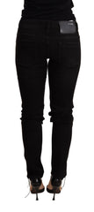 Acht schwarze Low-Waist Skinny-Jeans