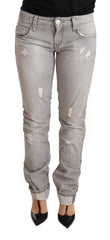 Acht Graue, zerrissene Baumwoll-Slim-Fit-Damenjeans mit umgeschlagenem Saum