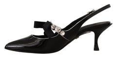 Dolce & Gabbana Slingpumps aus schwarzem Lackleder mit Kristallen