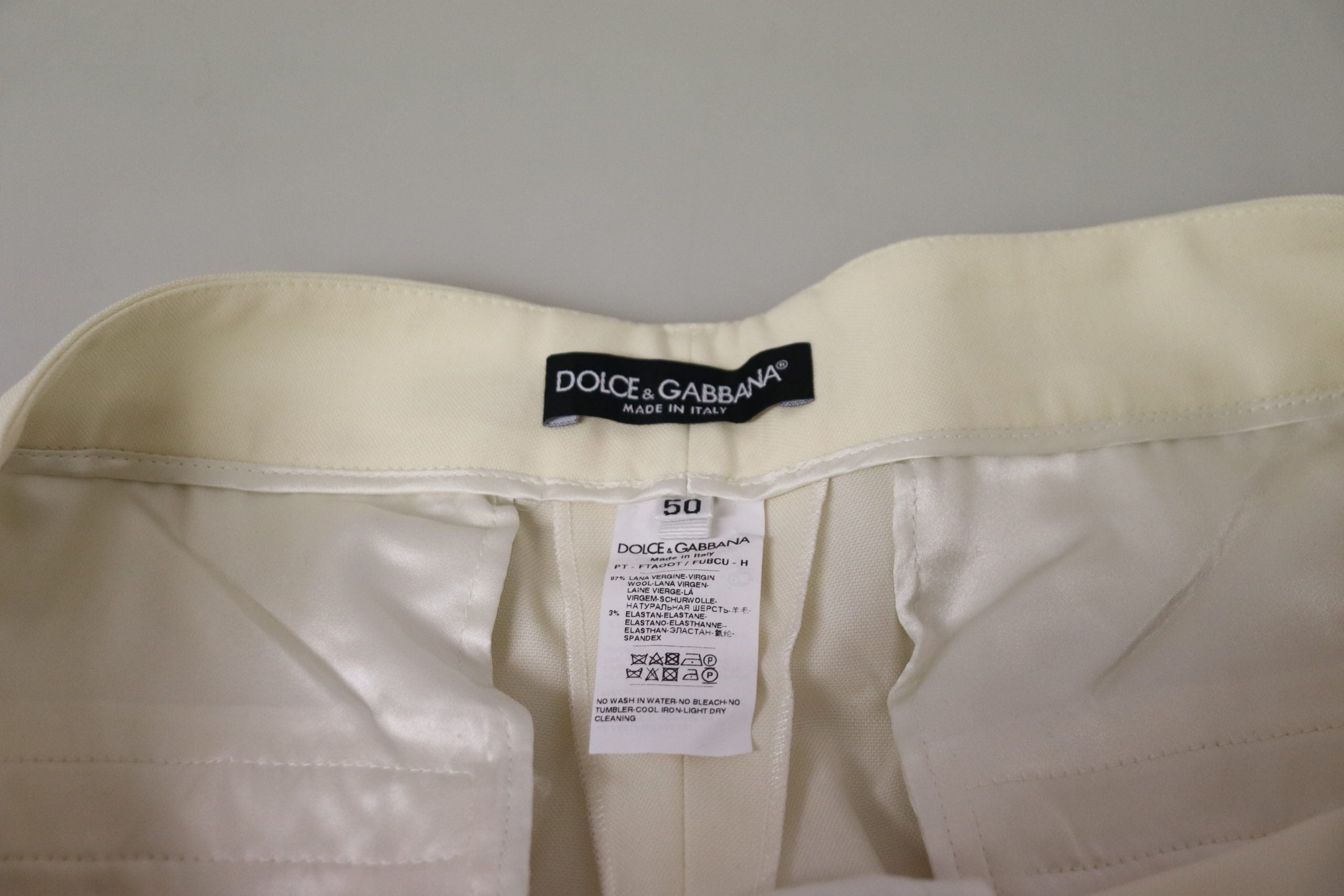 Dolce & Gabbana Elfenbeinweiße High Waist Cropped Hose mit umgeschlagenem Saum