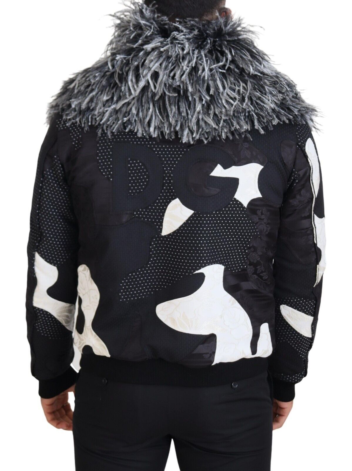 Dolce & Gabbana Jacke aus schwarzem und weißem Pelz-Shearling mit durchgehendem Reißverschluss