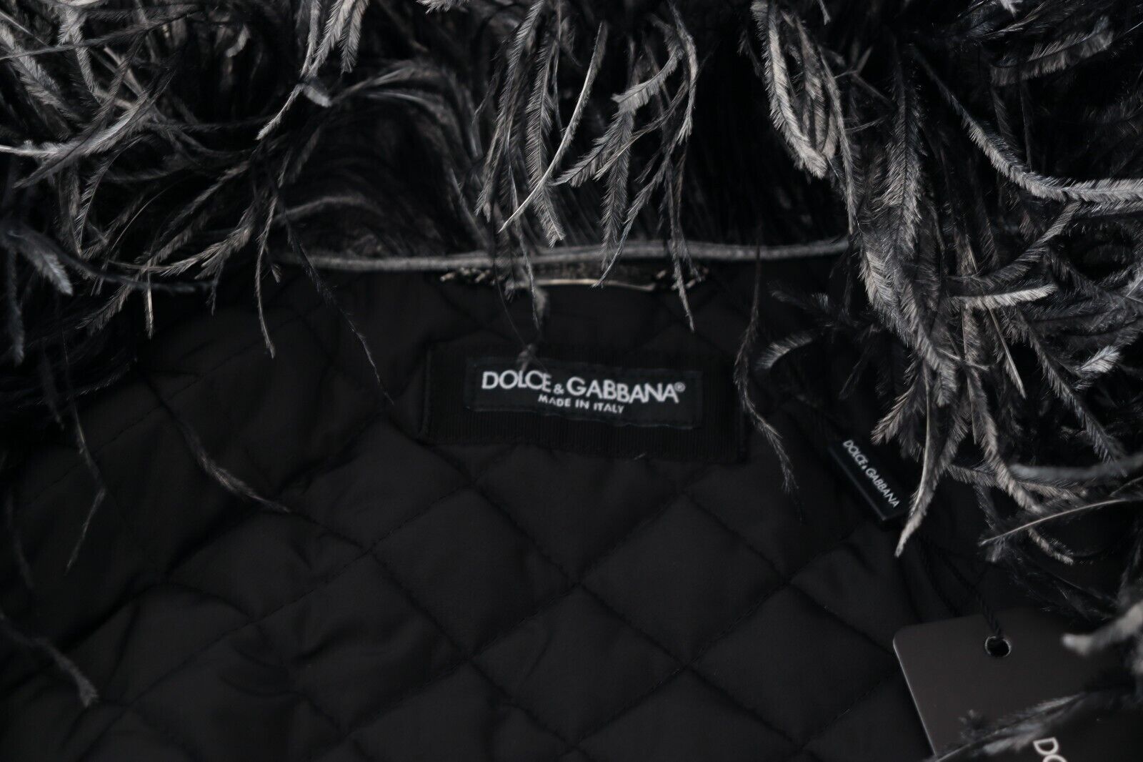 Dolce & Gabbana Jacke aus schwarzem und weißem Pelz-Shearling mit durchgehendem Reißverschluss