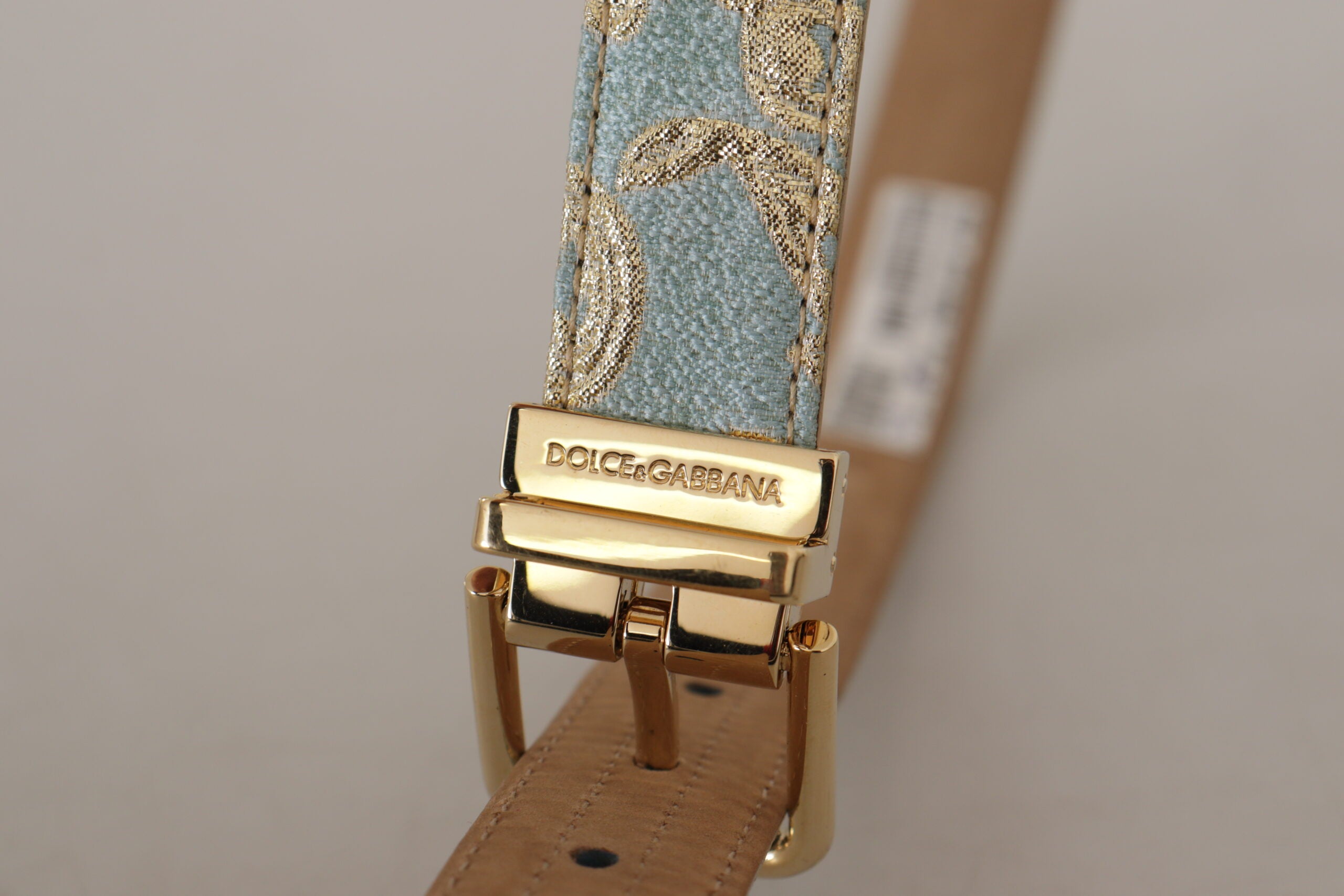 Dolce & Gabbana Gürtel aus blauem Leder mit Jacquardprägung und goldener Metallschnalle