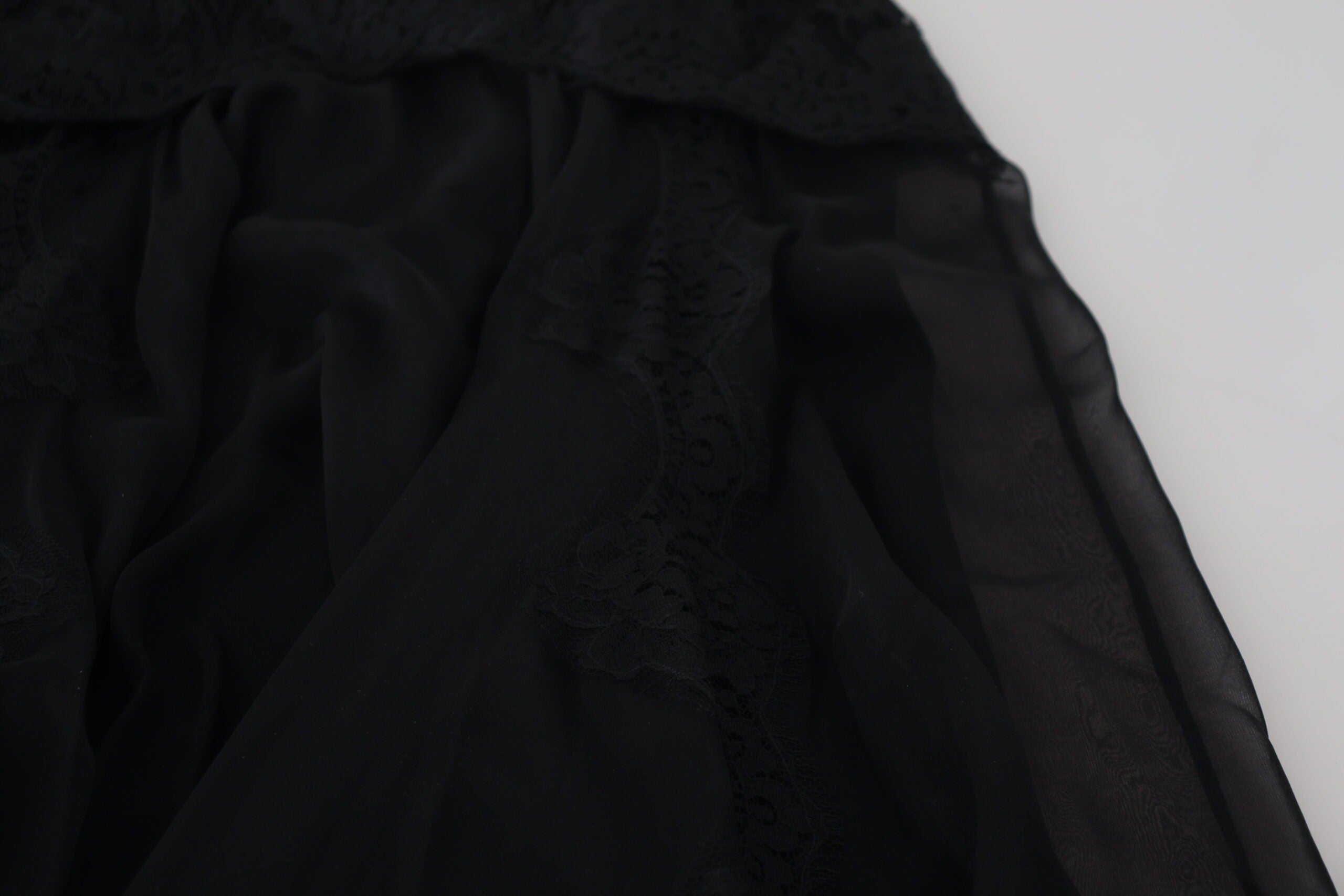 Dolce & Gabbana Schwarzer Seiden-Midi-Rock mit hoher Taille und Spitzenbesatz