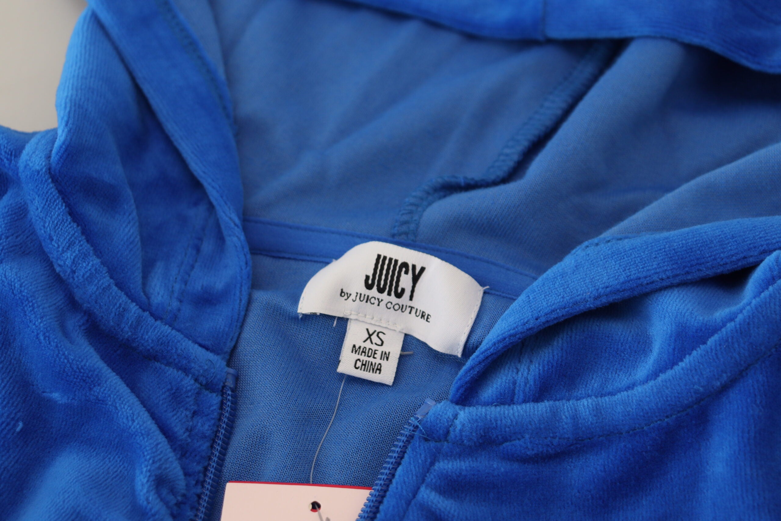 Juicy Couture Blaues Cropped Kapuzen-Sweatshirt aus Baumwolle mit durchgehendem Reißverschluss
