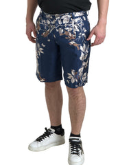 Dolce & Gabbana Blaue Herren-Bermudashorts aus Seide mit Blumenmuster