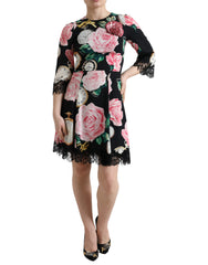 Dolce & Gabbana Schwarzes A-Linien-Kleid aus Spitze mit floralen Verzierungen