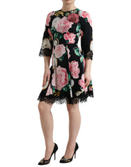 Dolce & Gabbana Schwarzes A-Linien-Kleid aus Spitze mit floralen Verzierungen