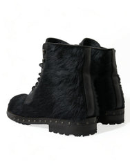 Dolce & Gabbana Schwarze kniehohe Stiefel aus Leder im Pony-Stil