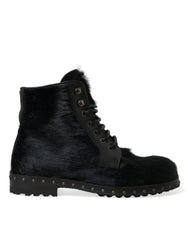 Dolce & Gabbana Schwarze kniehohe Stiefel aus Leder im Pony-Stil