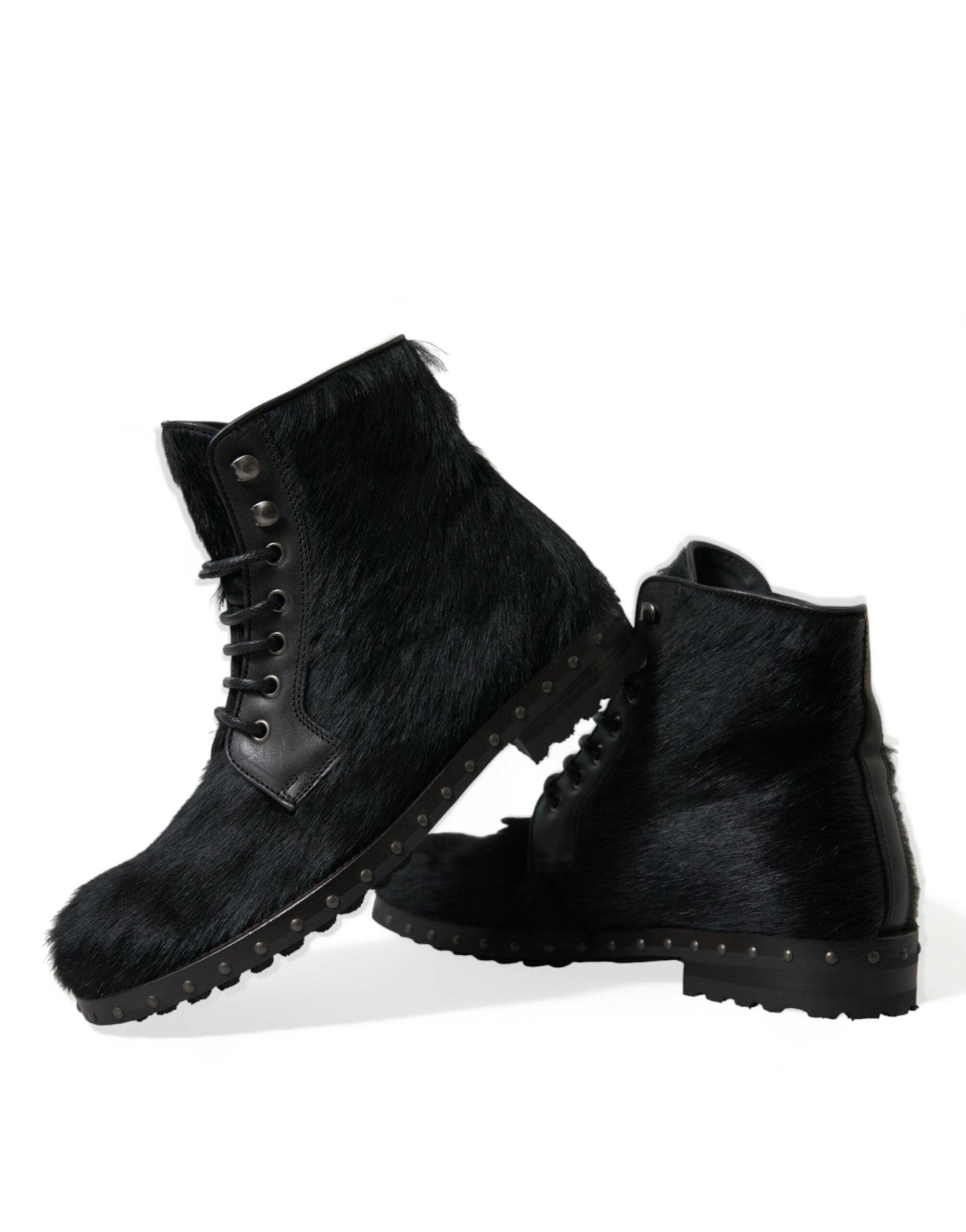 Dolce & Gabbana Schwarze kniehohe Stiefel aus Leder im Pony-Stil