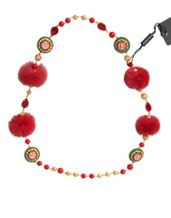 Dolce & Gabbana Goldfarbene Messingkette mit roten Pelzelementen und Carretto-Kristallen
