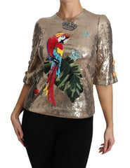 Dolce & Gabbana Goldene Paillettenbluse mit Papagei-Kristallmotiv