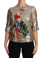 Dolce & Gabbana Goldene Paillettenbluse mit Papagei-Kristallmotiv