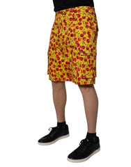 Dolce & Gabbana Gelbe Baumwoll-Bermudashorts für Herren mit Kirschprint